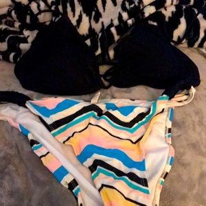 Bikini bathing suit top is a OP large and bottom is medium